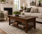 Craftsman style solid wood coffee table with slatted sides and lower shelf in a cozy living room
