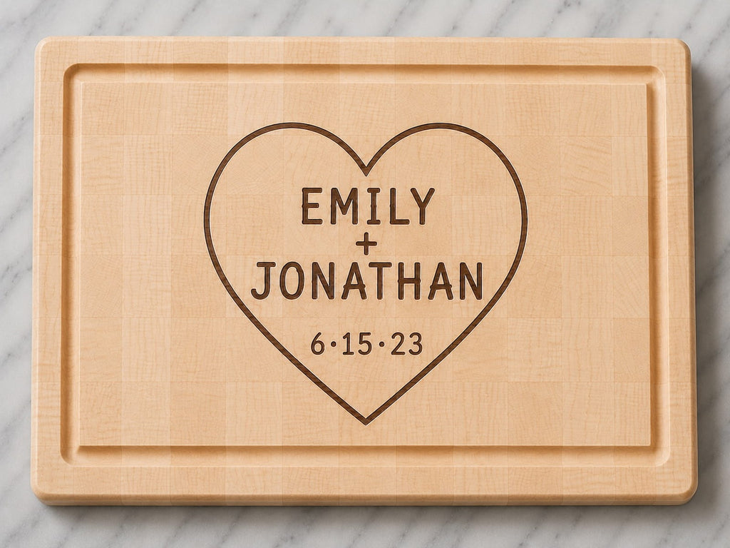Maple end grain cutting board engraved with couples names, anniversary date, and heart design