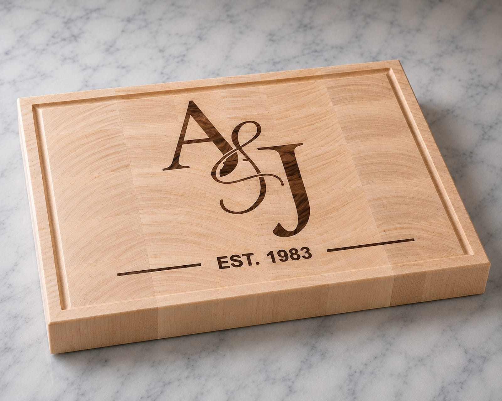 Maple end grain cutting board with walnut couples monogram inlay and established date engraving