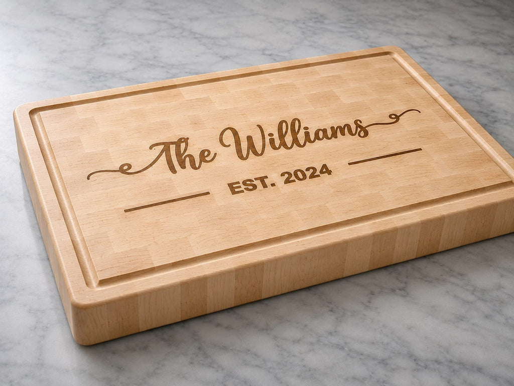 Maple end grain cutting board engraved with family name and established date