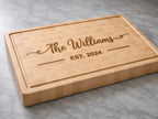 Maple end grain cutting board engraved with family name and established date