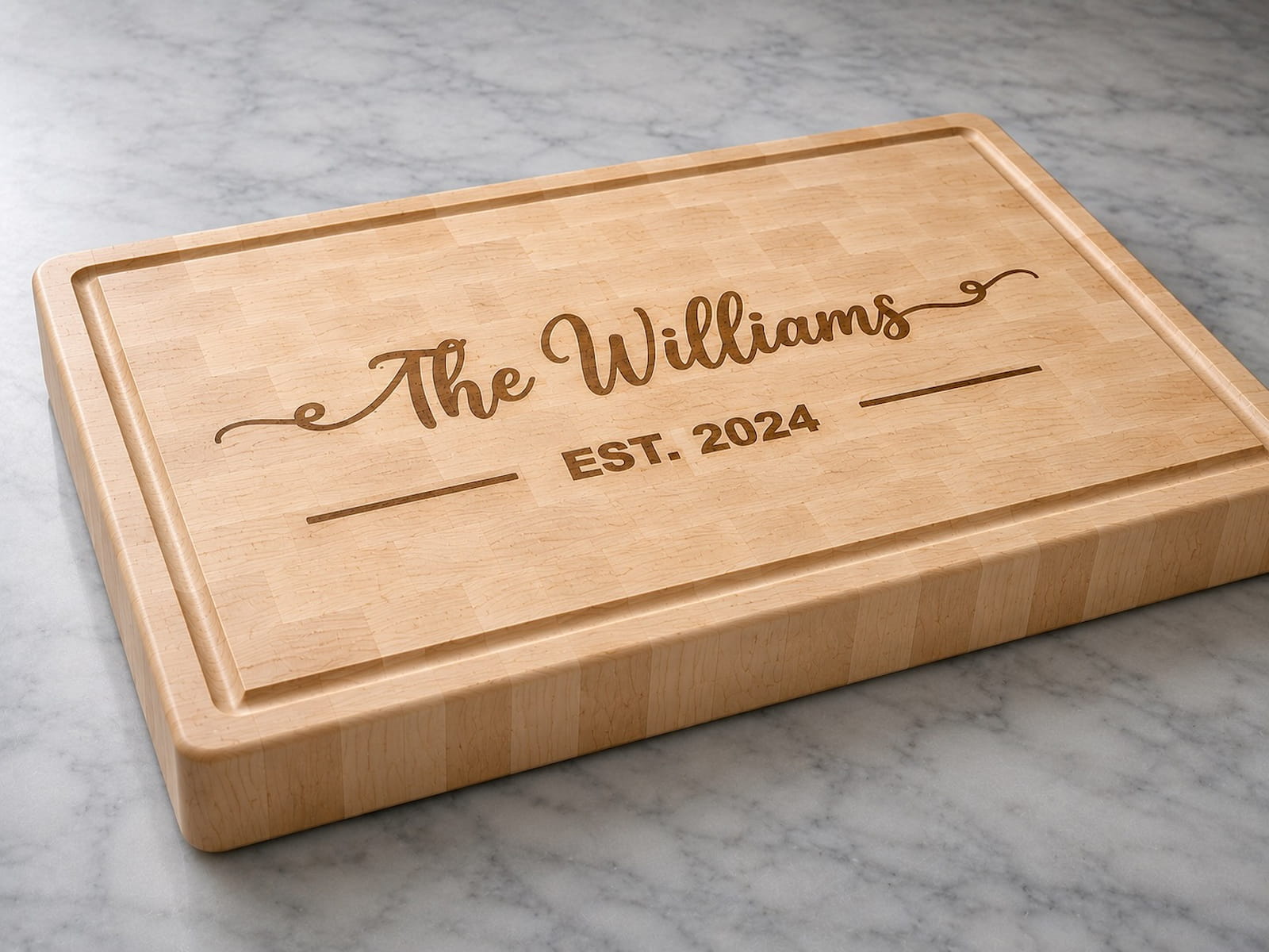 Maple end grain cutting board engraved with family name and established date