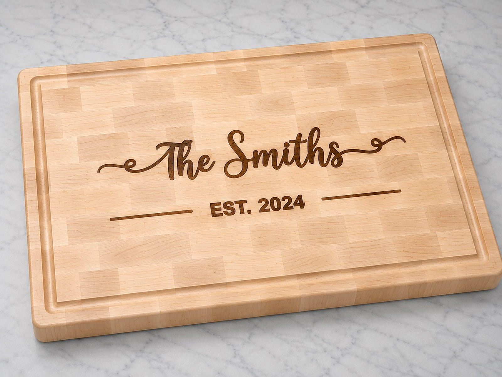 Maple end grain cutting board with walnut family name inlay and established 2024 engraving