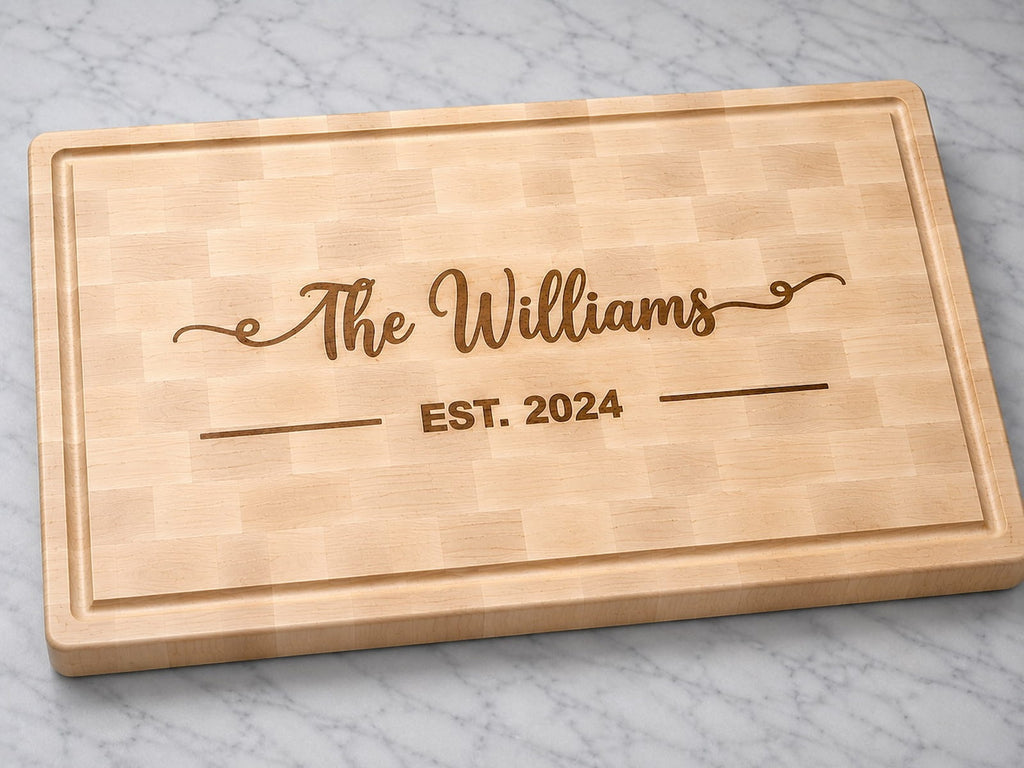 Maple end grain cutting board with walnut family name inlay and established date engraving