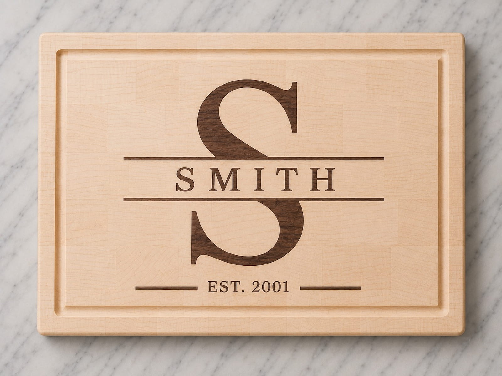 Maple end grain cutting board with walnut split monogram inlay, family name, and established 2001 engraving