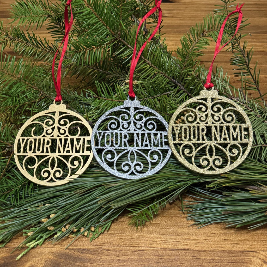 Personalized Christmas ornaments in gold, glitter gold, and glitter silver finishes