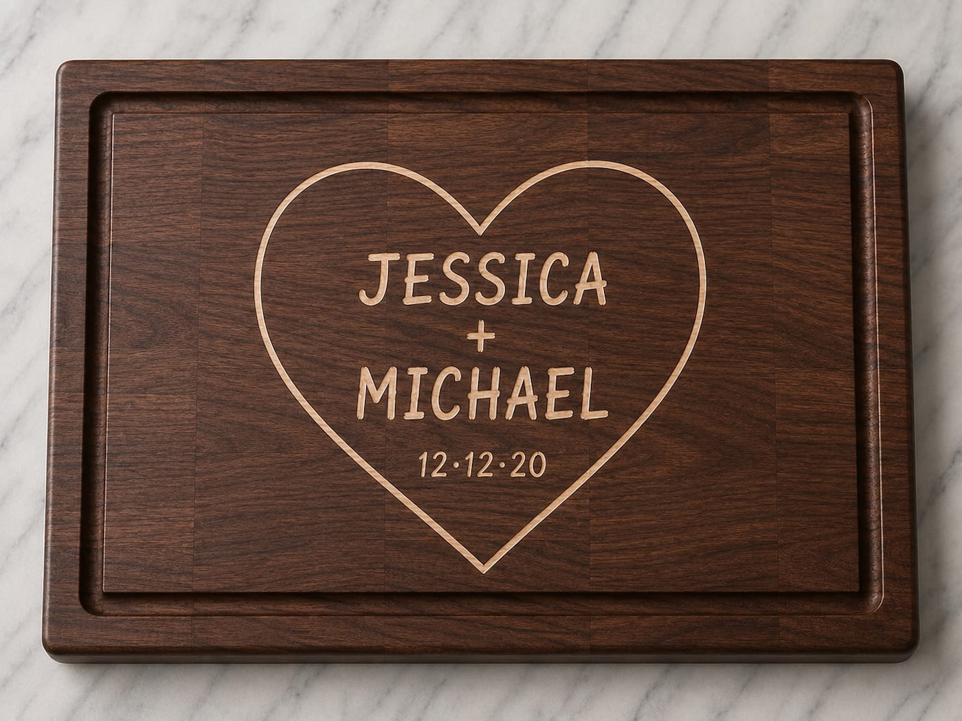 Walnut cutting board with personalized heart engraving featuring couple names and anniversary date