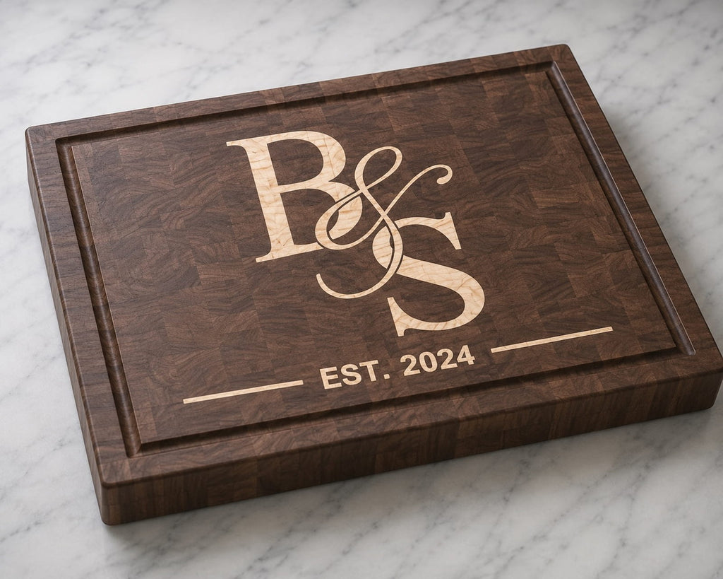 Walnut end grain cutting board with maple couples monogram inlay and established date engraving