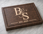 Walnut end grain cutting board with maple couples monogram inlay and established date engraving