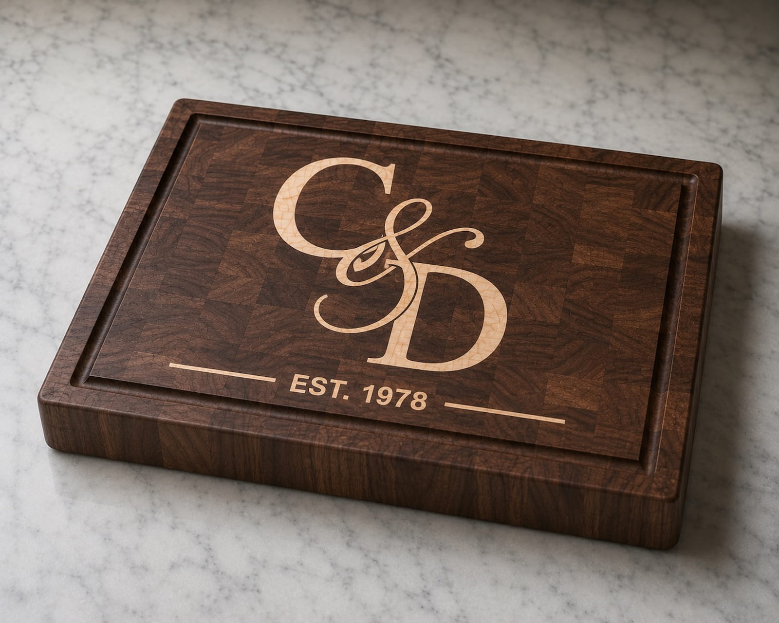Walnut end grain cutting board with maple couples monogram inlay and established date