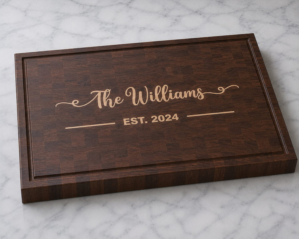 Walnut end grain cutting board with maple family name inlay and established 2024 engraving