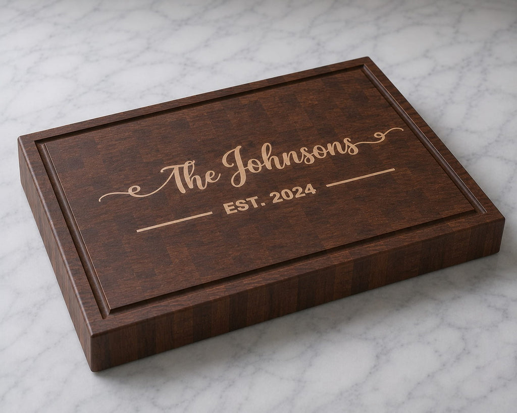 Personalized walnut end grain cutting board featuring maple inlay family name design for The Johnsons with established 2024 detail