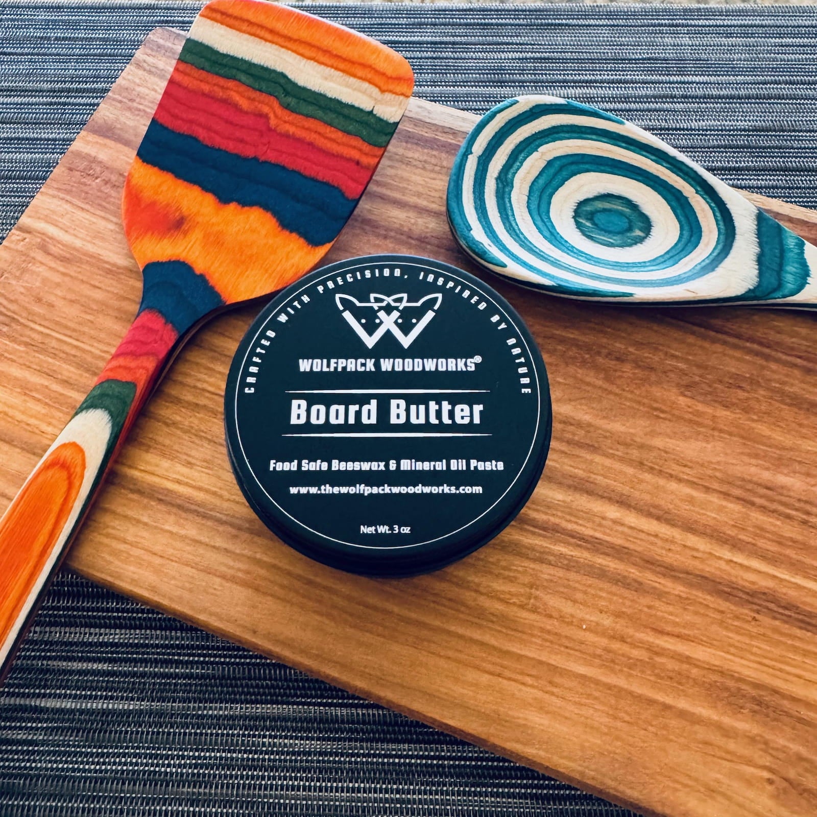 Wolfpack Woodworks board butter food safe wood conditioner on handcrafted serving board